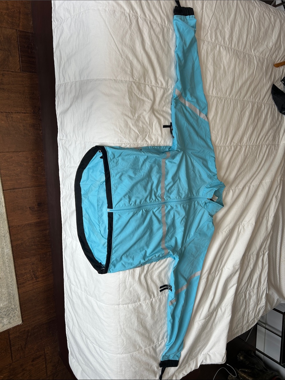 Light Blue MEC Windbreaker Jacket with Reflective Striping. Women’s medium